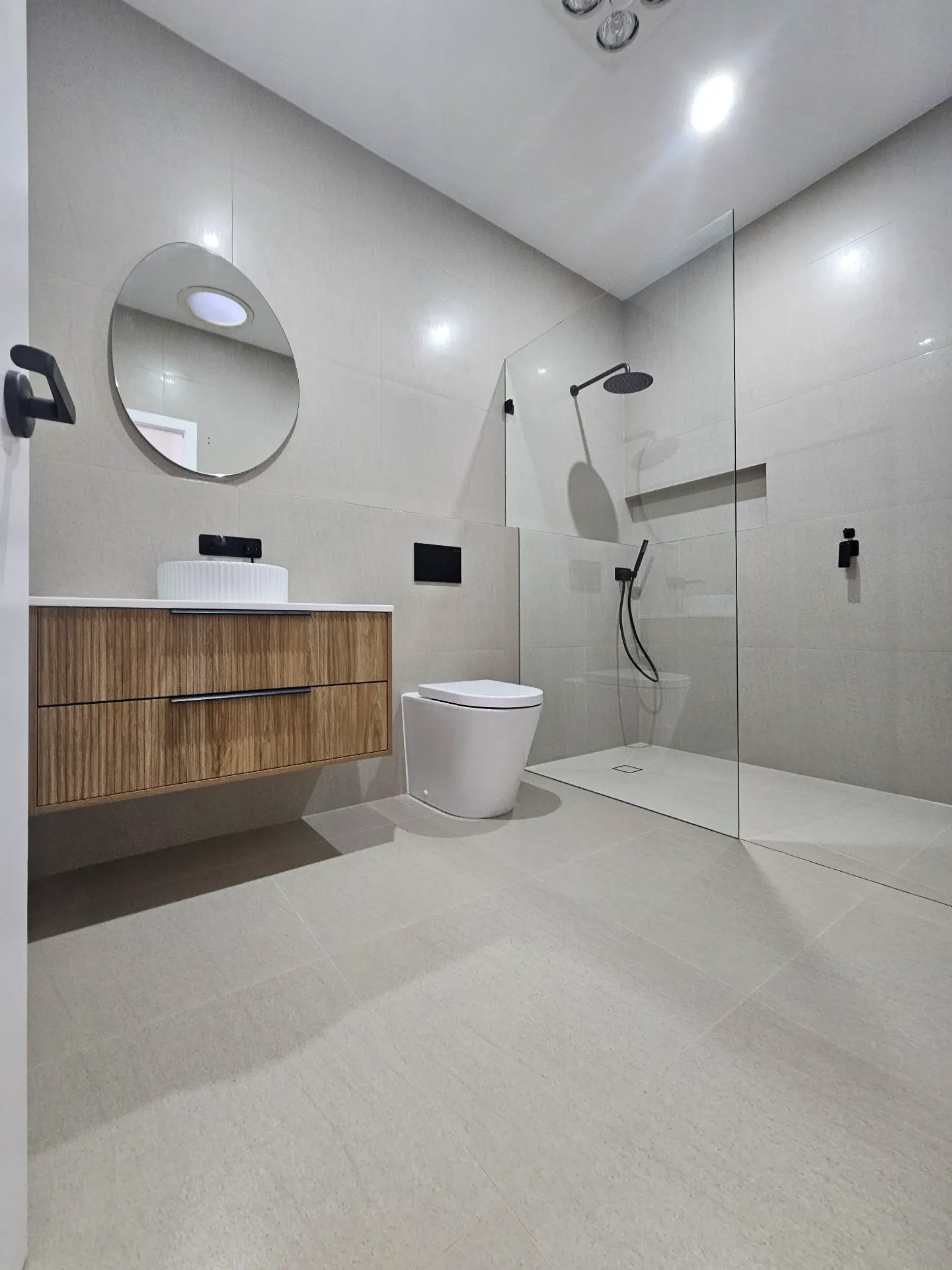 Premium bathroom renovation with fluted timber vanity