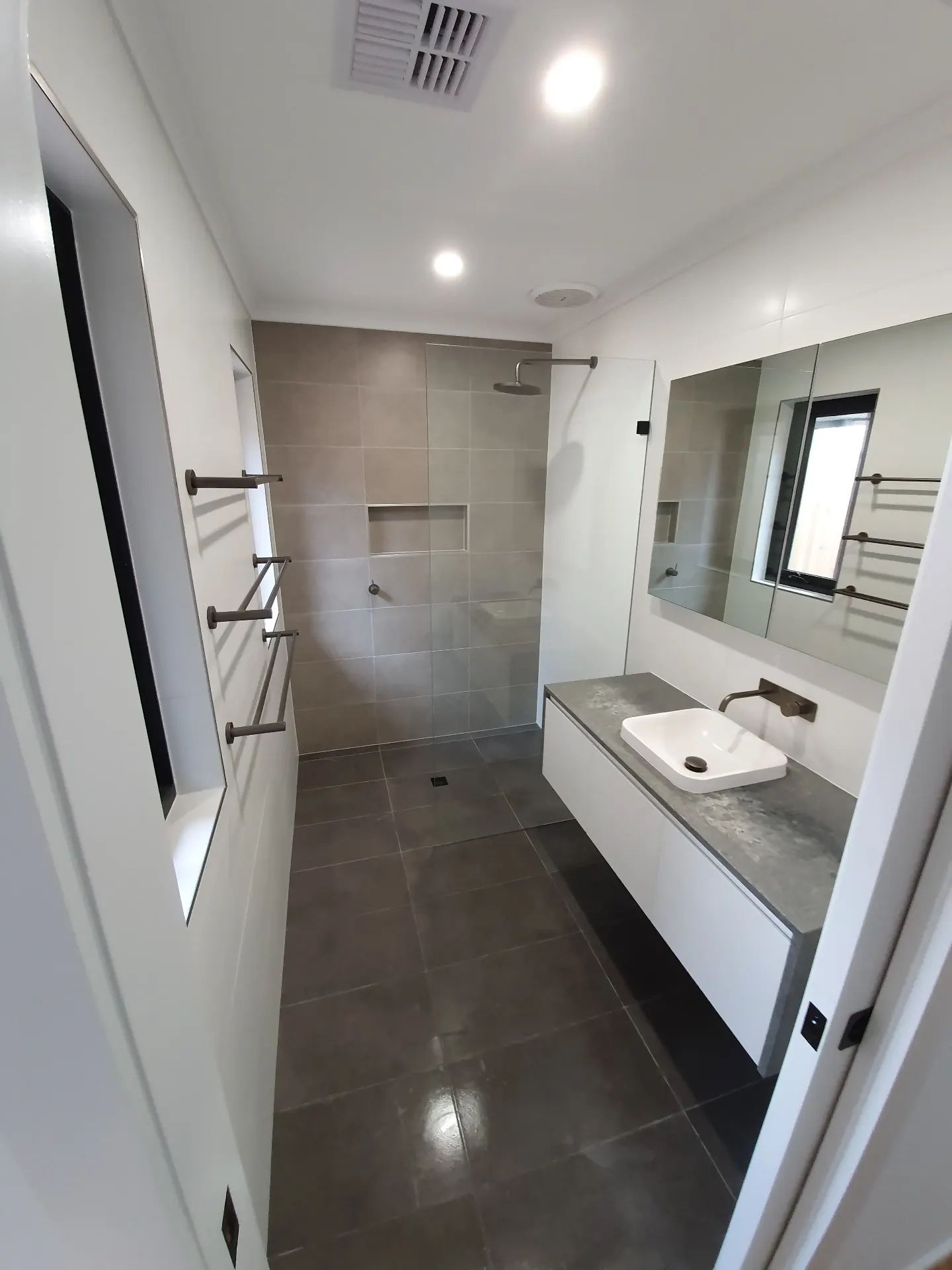 Newport master bathroom in grey stone