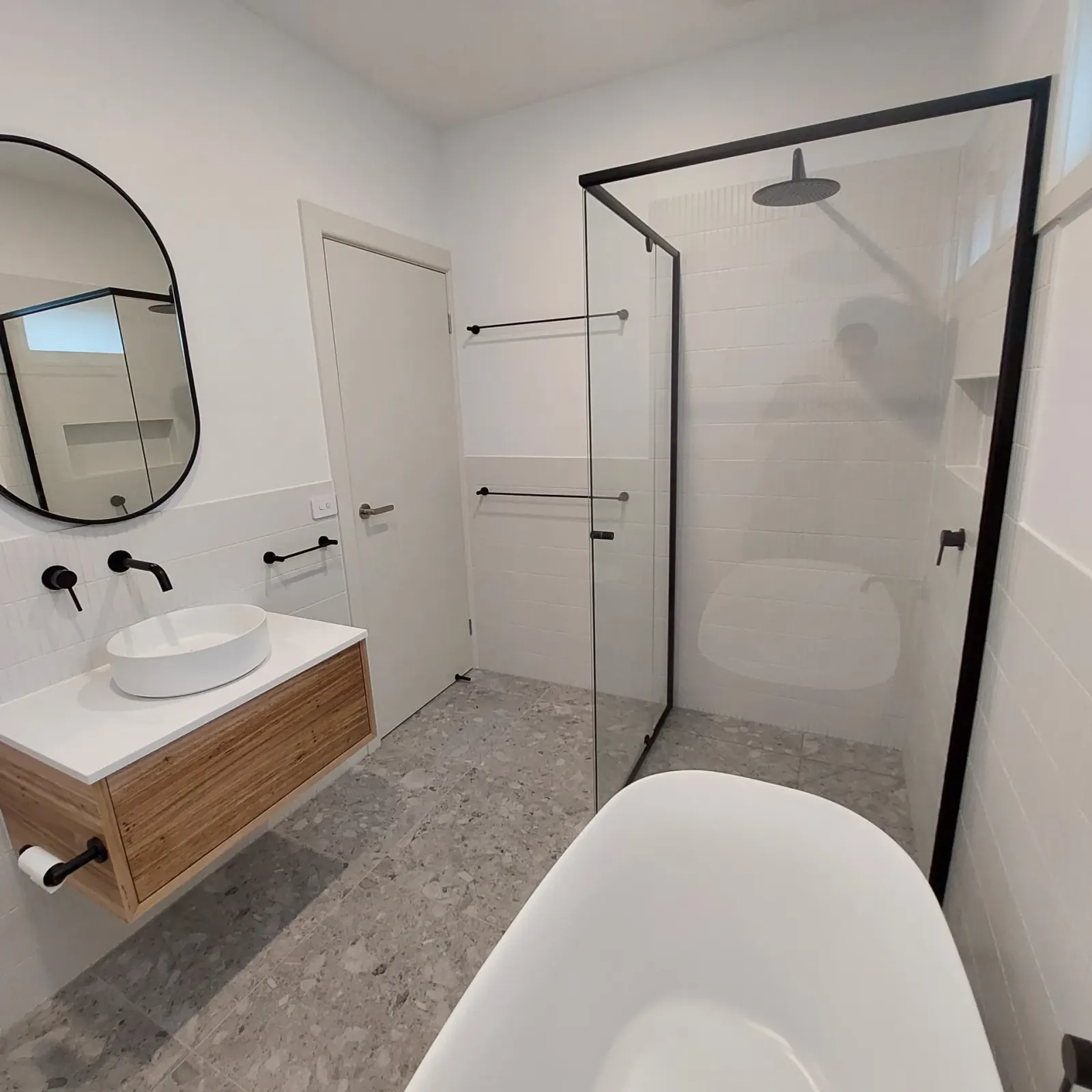 Williamstown bathroom with terrazzo and timber vanity