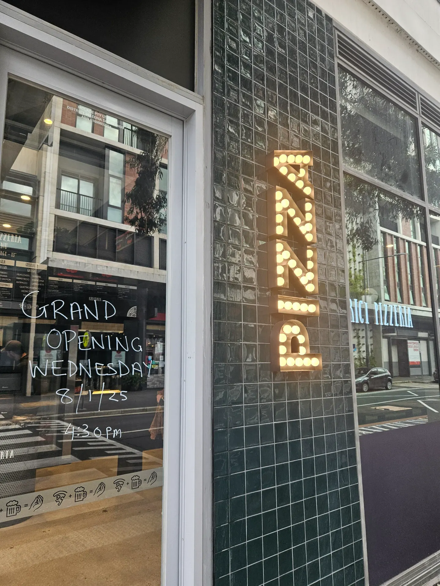 Pizzeria marquee signage