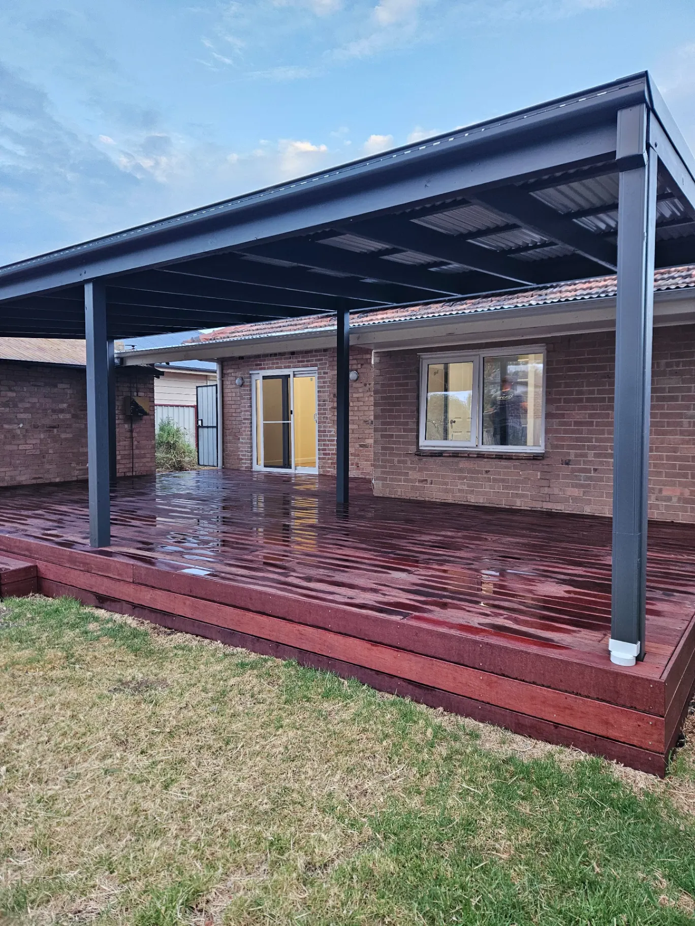 Merbau deck with steel pergola and integrated lighting