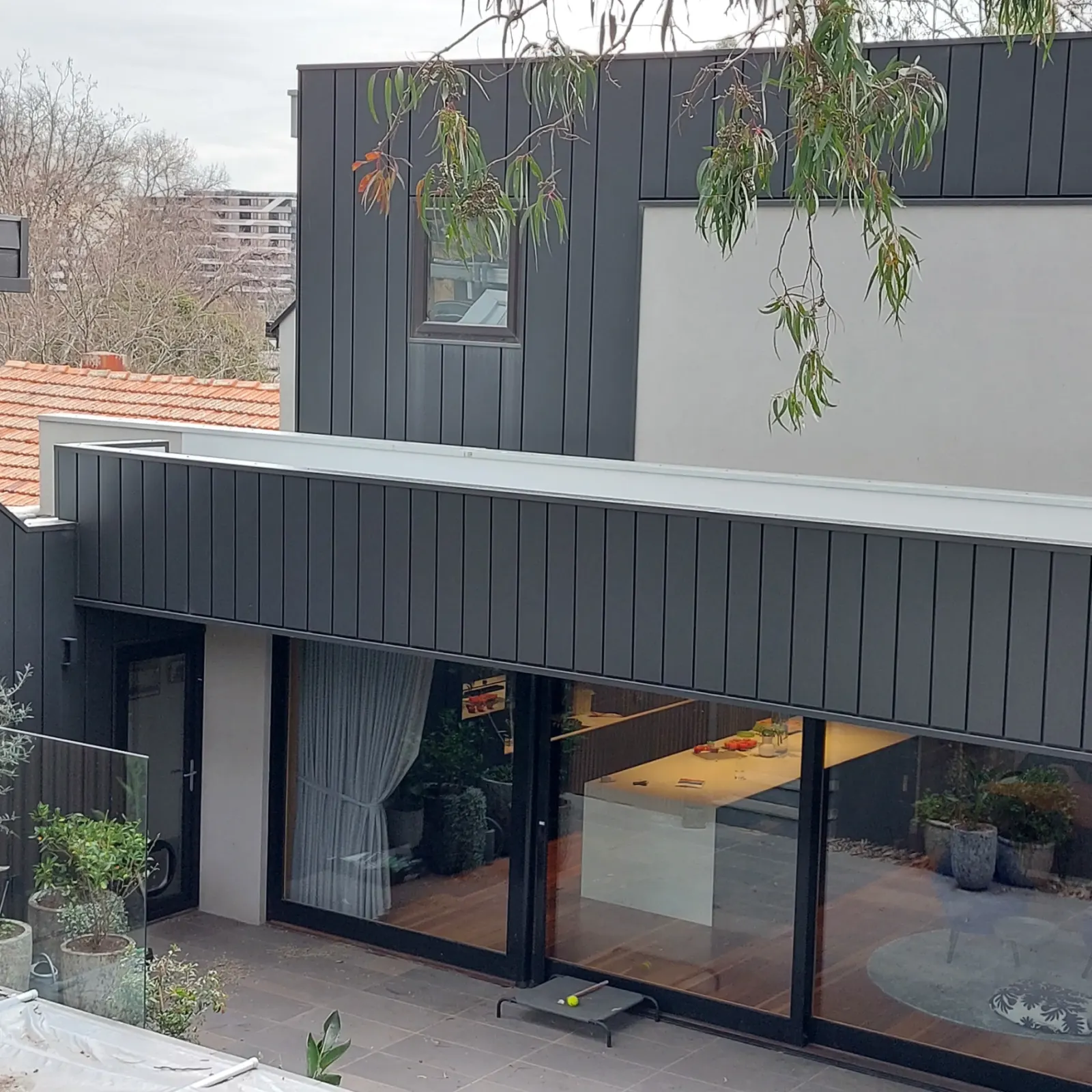 Double-storey zinc-clad extension on a heritage home