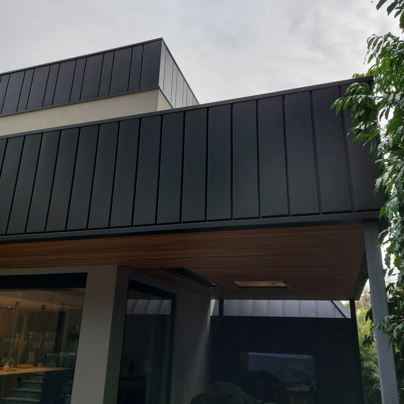 Modern zinc-clad extension on a heritage home